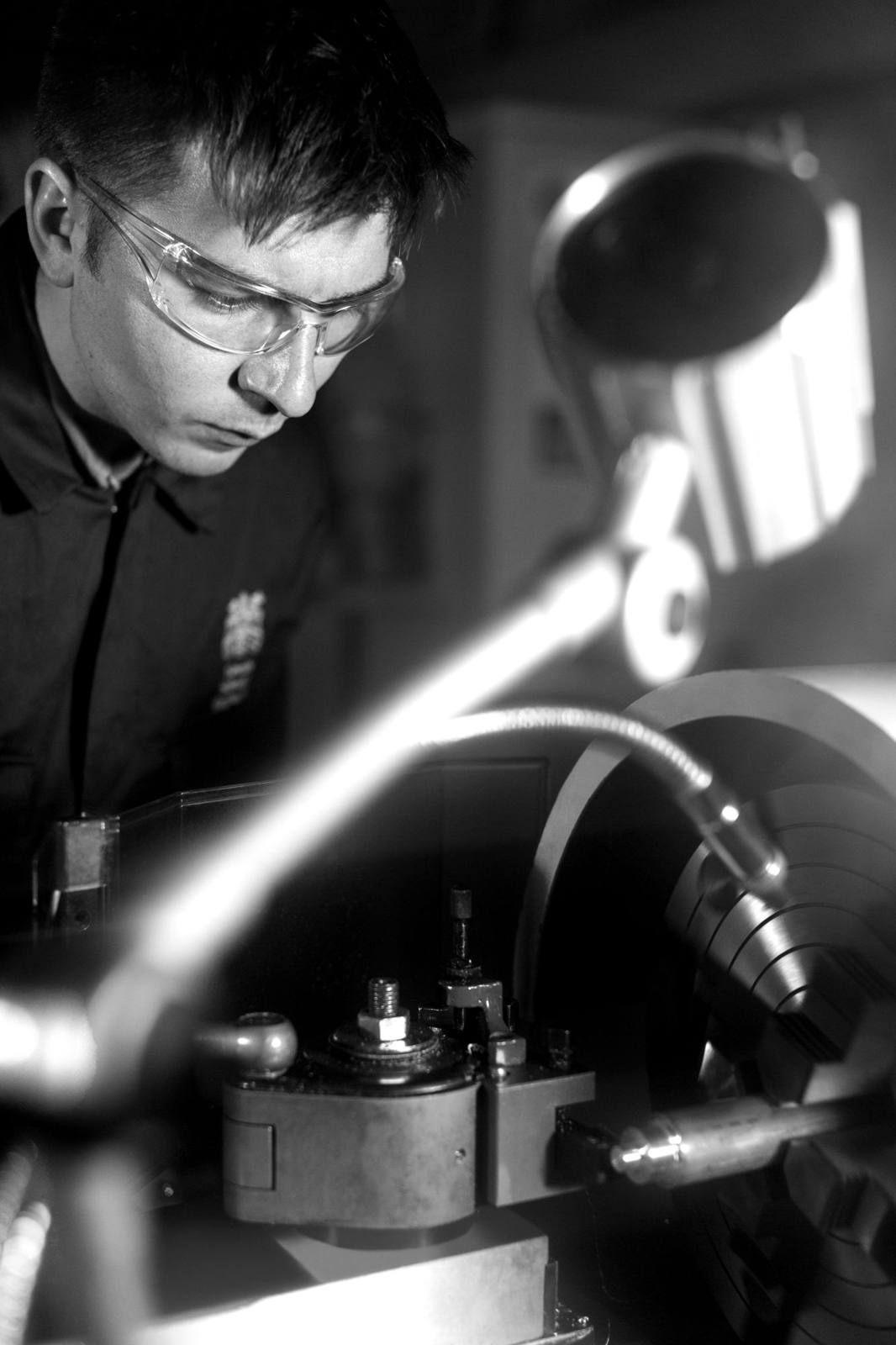 Engineer working at a lathe