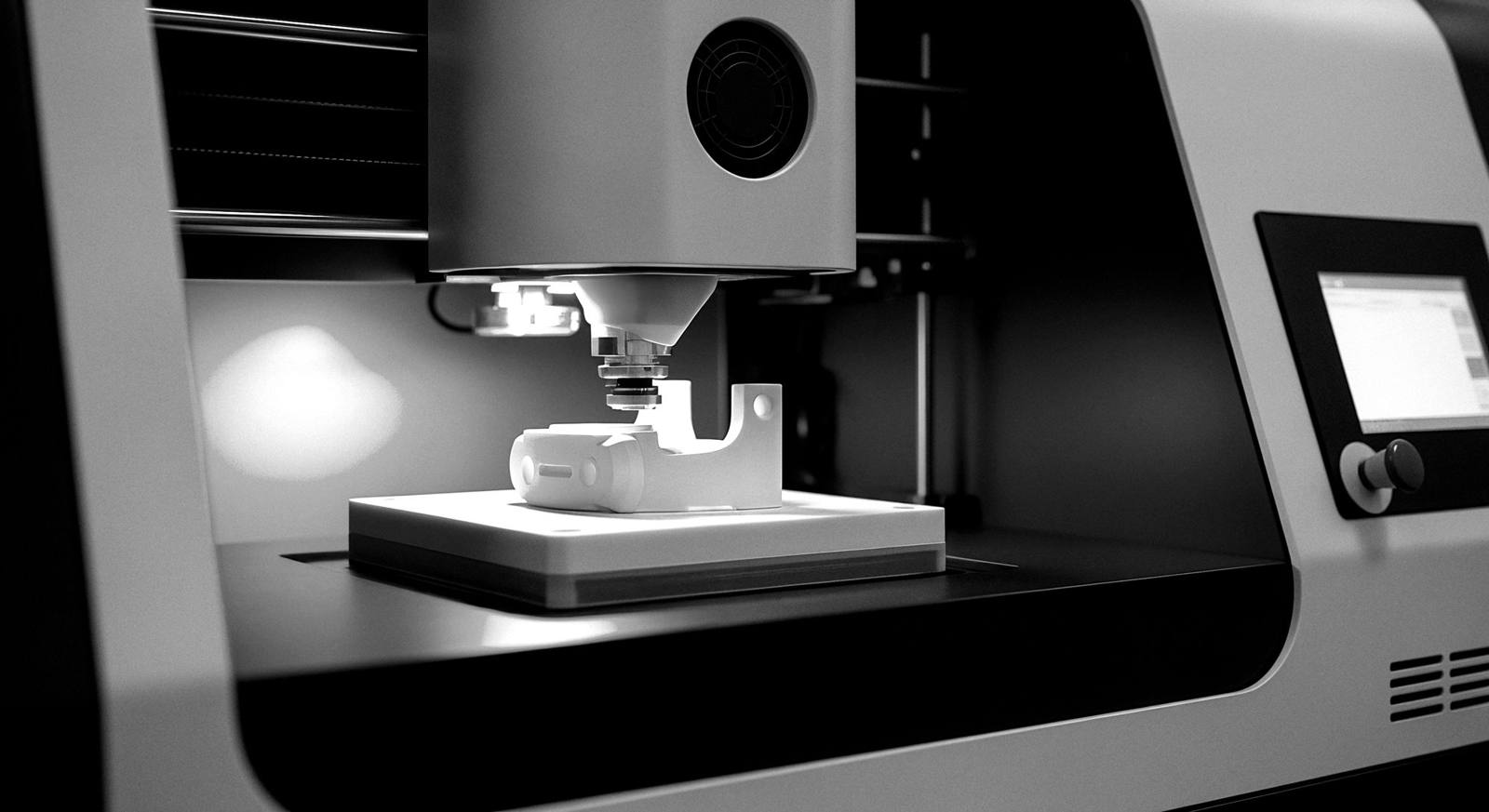 Prototype part on a 3D printer bed